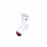 A pair of white crew socks with a maroon toe to indicate the size for easy sorting.